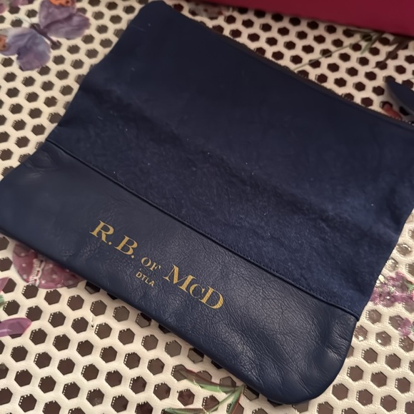 R.B. Of McD #2 clutch navy / brown zip pouch 
GUC